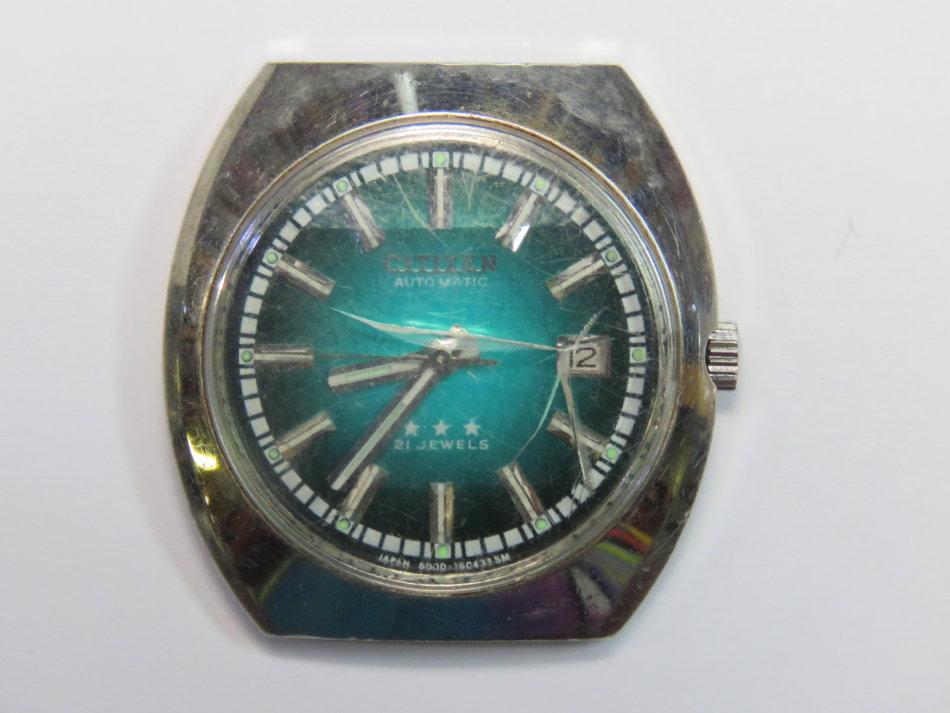 green face citizen watch